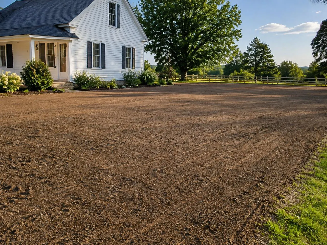 Leveled and power-raked lawn ready for seed in Connecticut